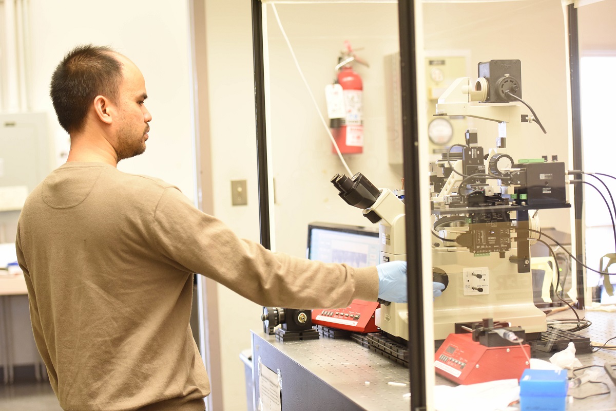 Student in physics lab